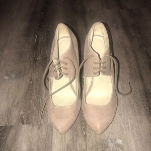 Nude/Tan Wedged Pointed toe heels with Laces.